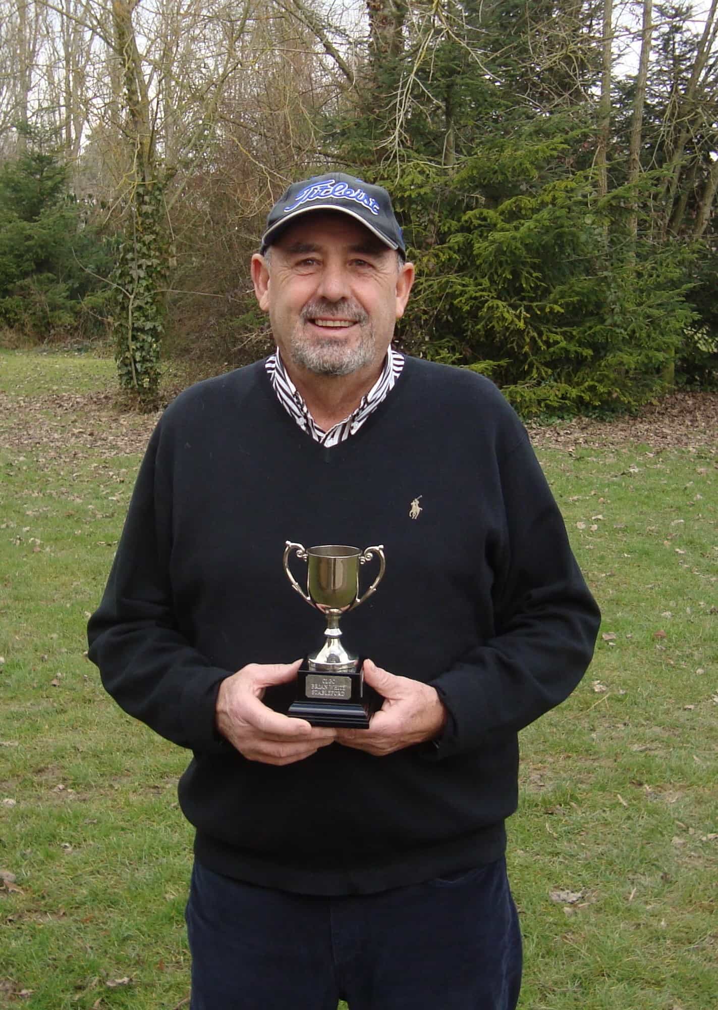 Richard Poyser poses with the trophy